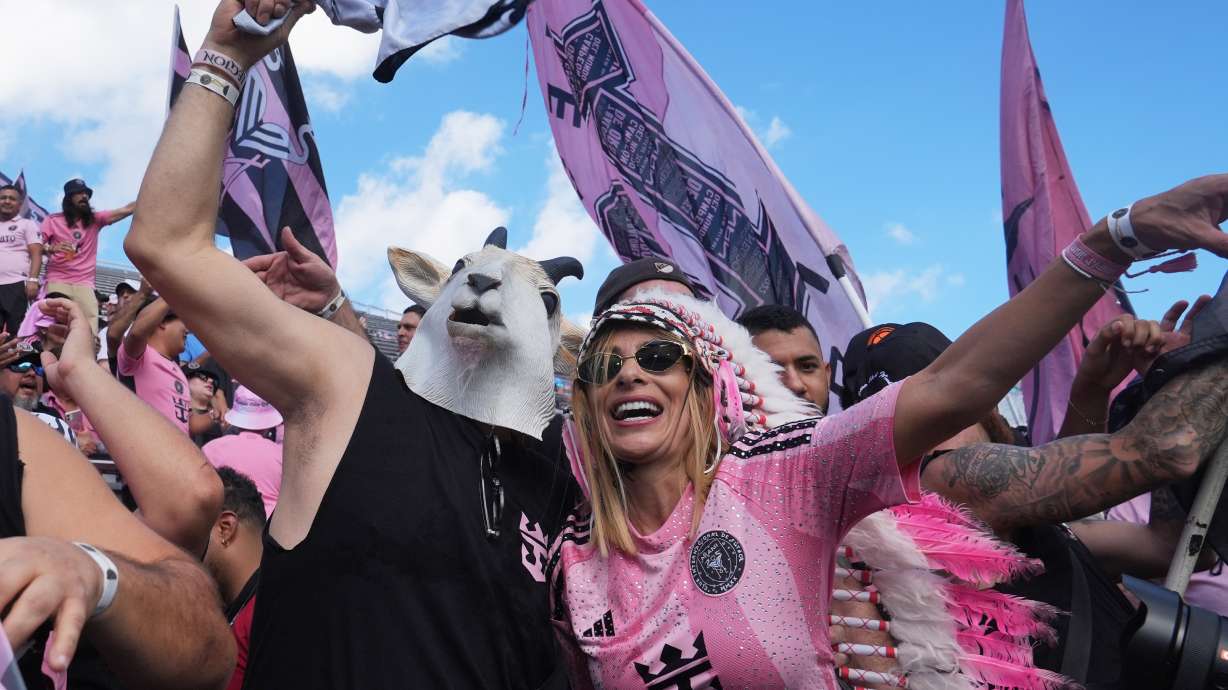 Inter Miami fans cheer before the MLS Cup final soccer match against the Vancouver Whitecaps Saturday, Dec. 6, 2025, in Fort Lauderdale, Fla.