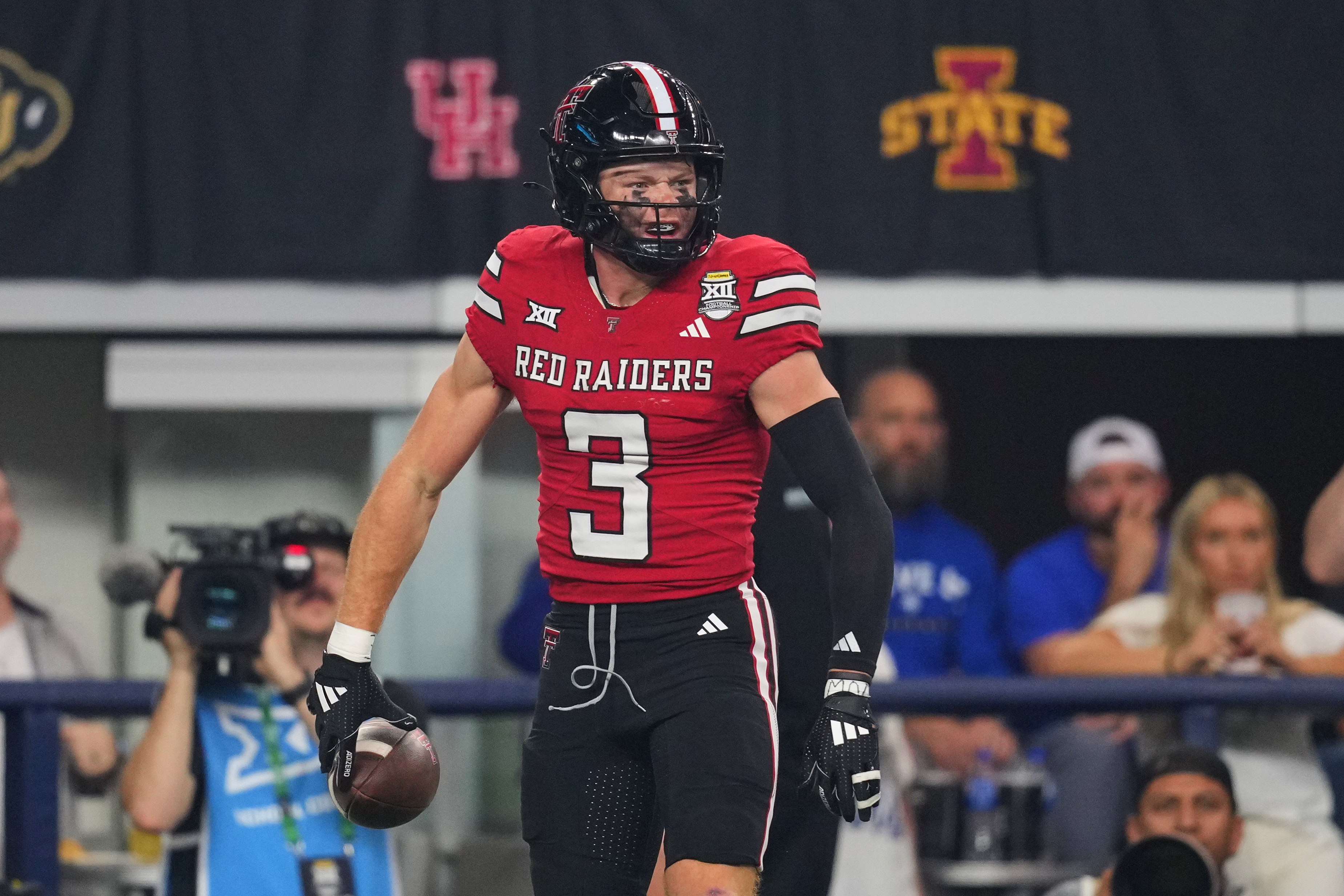 Texas Tech wide receiver Coy Eakin celebrates after catching a touchdown pass in the first half of a Big 12 Conference championship NCAA college football game against BYU Saturday, Dec. 6, 2025, in Arlington, Texas. 