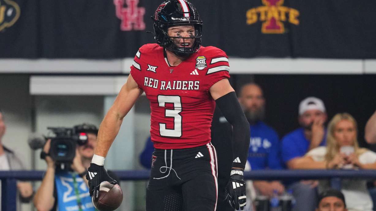 Texas Tech wide receiver Coy Eakin celebrates after catching a touchdown pass in the first half of a Big 12 Conference championship NCAA college football game against BYU Saturday, Dec. 6, 2025, in Arlington, Texas.