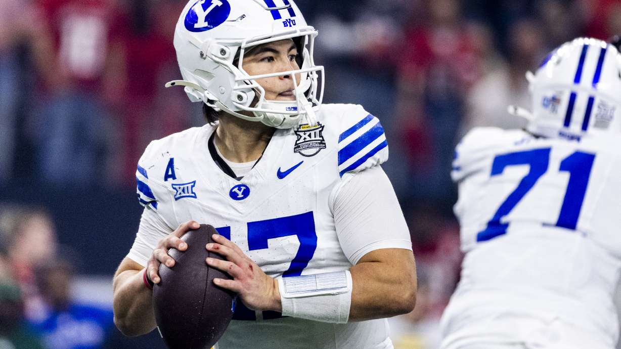 BYU quarterback Bear Bachmeier (47) winds up for a pass during the Big 12 championship game against Texas Tech at AT&T Stadium in Arlington, Texas, on Saturday, Dec. 6, 2025.
