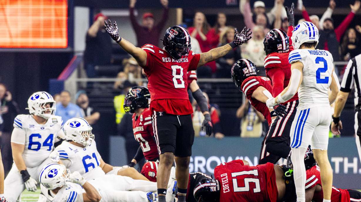 Texas Tech defensive lineman E'Maurion Banks (8) celebrates after a play against BYU during the Big 12 championship game at AT&T Stadium in Arlington, Texas, on Saturday, Dec. 6, 2025.