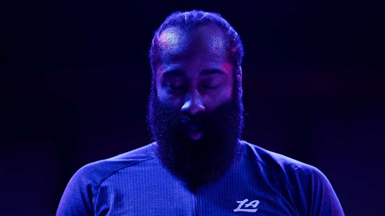 Los Angeles Clippers guard James Harden (1) stands during the national anthem before an NBA basketball game against the Minnesota Timberwolves Saturday, Dec. 6, 2025, in Minneapolis.
