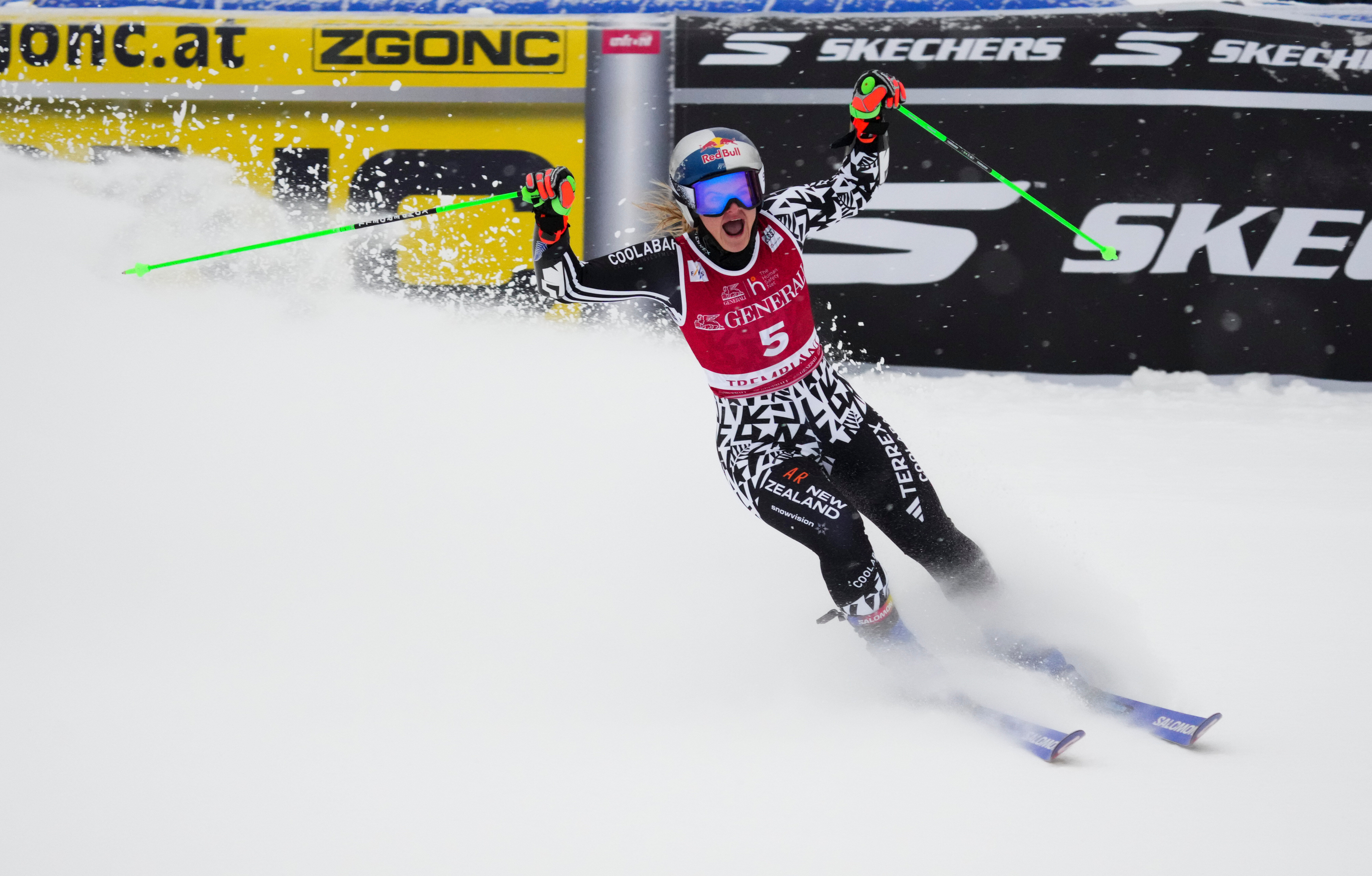 Alice Robinson, of New Zealand, celebrates her first place finish in the women's World Cup giant slalom in Mont Tremblant, Quebec, Saturday, Dec. 6, 2025.