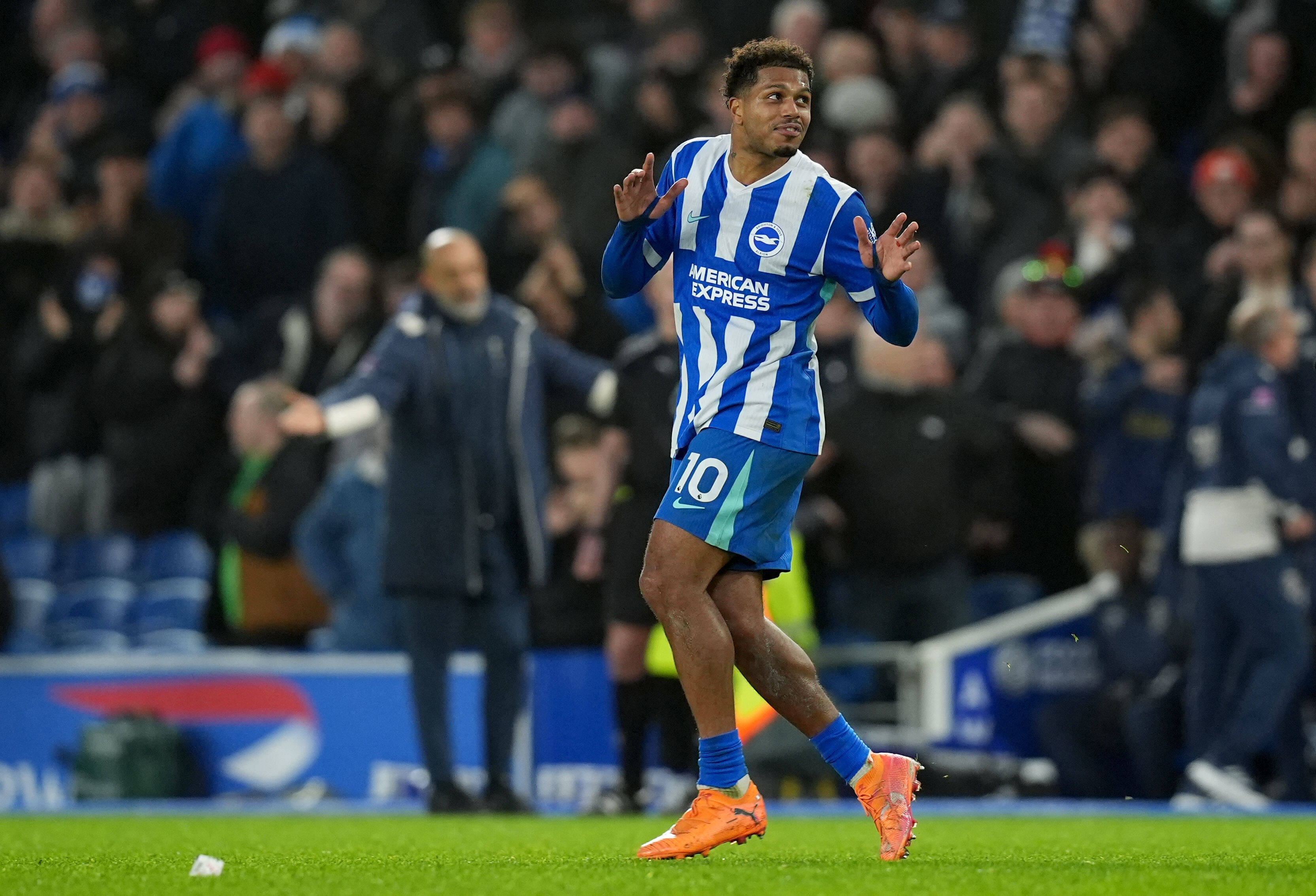 Brighton and Hove Albion's Georginio Rutter celebrates after scoring his sides first goal during the English Premier League soccer match between Brighton and Hove Albion v West Ham United, in Brighton, England, Sunday, Dec. 7, 2025.