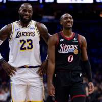 James hits go-ahead 3 and scores 29 points, Doncic has triple-double in Lakers' win over 76ers