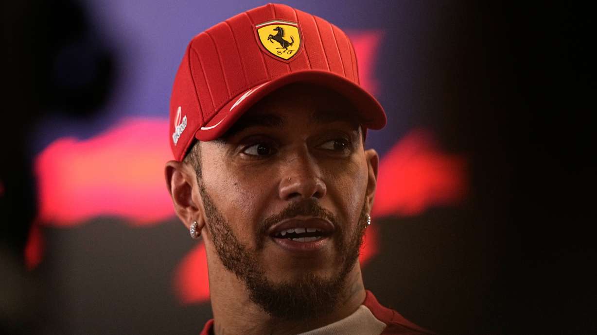 Ferrari driver Lewis Hamilton of Britain reacts after the Formula One Abu Dhabi Grand Prix at the Yas Marina Circuit in Abu Dhabi, UAE, Sunday, Dec. 7, 2025.