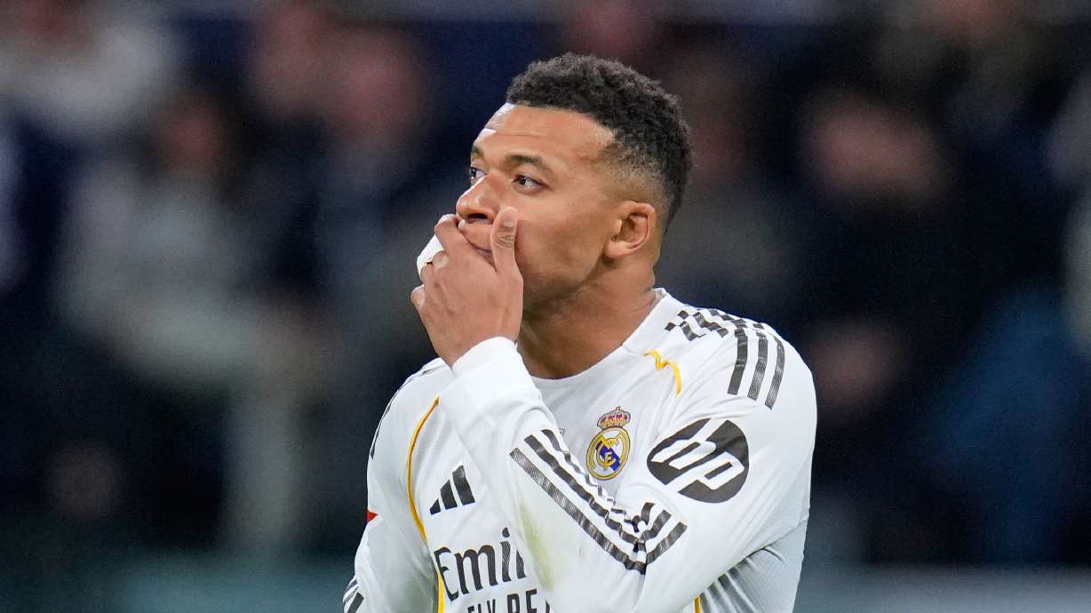 Real Madrid's Kylian Mbappe reacts during the Spanish La Liga soccer match between Real Madrid and Celta Vigo in Madrid, Spain, Sunday, Dec. 7, 2025.