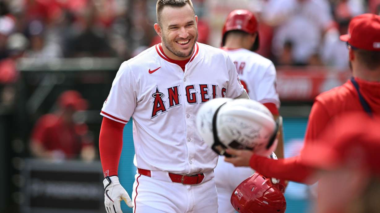 FILE - Los Angeles Angels' Mike Trout celebrates after his solo home run against the Houston Astros during the first inning of a baseball game, Sept. 28, 2025, in Anaheim, Calif.