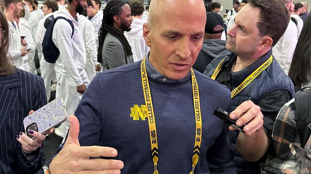FILE - Notre Dame Athletic Director Pete Bevacqua talks during media day ahead of the College Football Playoff national championship game between Ohio State and Notre Dame Jan. 18, 2025, in Atlanta.