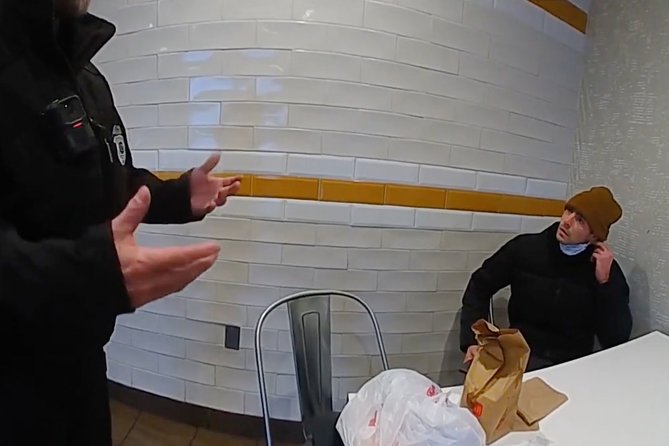 This image taken from video released by Pennsylvania State Police shows Luigi Mangione, a suspect in the fatal shooting of UnitedHealthcare CEO Brian Thompson, at a McDonald's in Altoona, Pa., on Dec. 9, 2024. The footage was released to the public on Tuesday.