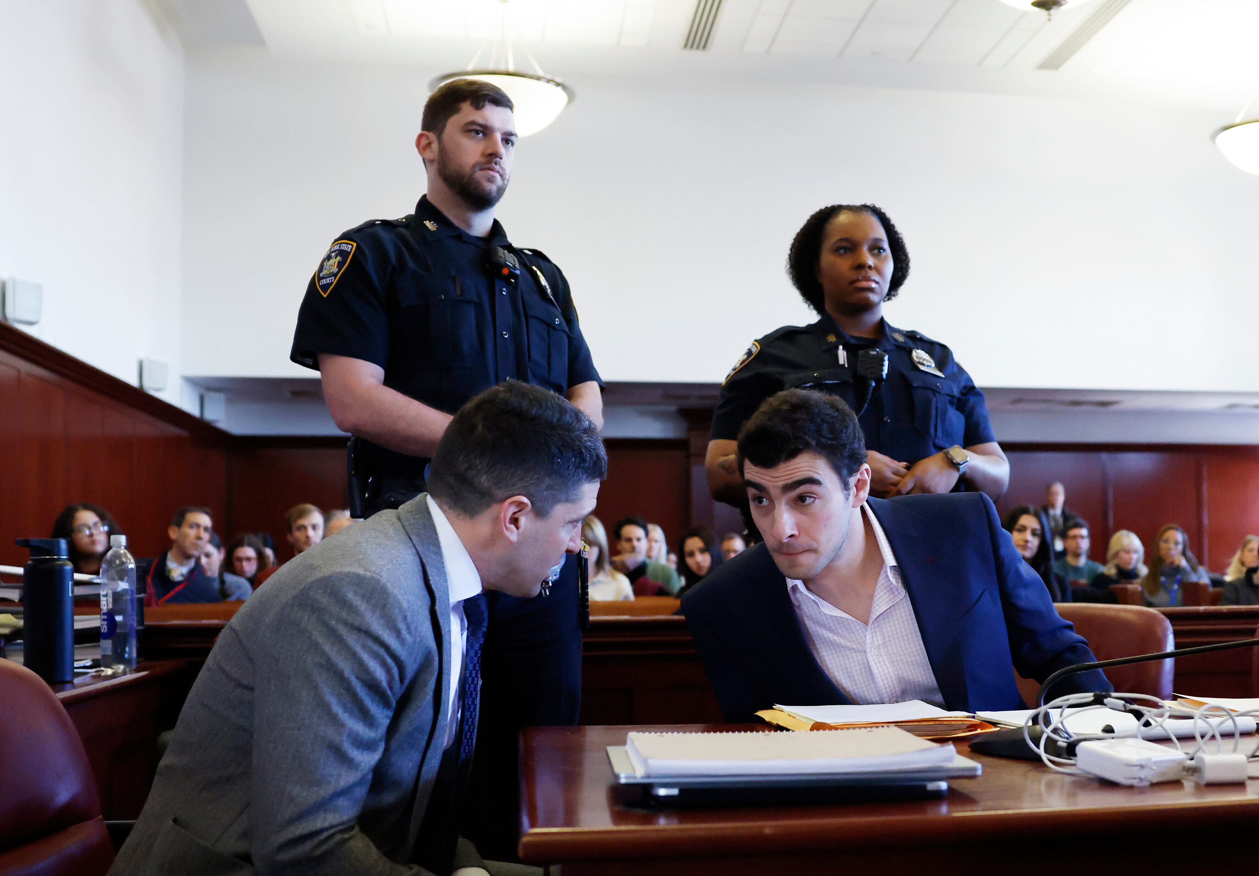 Luigi Mangione appears in Manhattan Criminal Court for an evidence hearing, Tuesday, in New York. Handwritten notes revealed in court detailed Mangione's to-do list and travel plans to avoid capture after the killing of Brian Thompson.