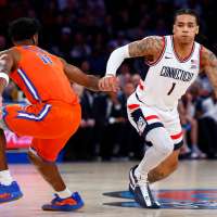 Ball scores 19 points as No. 5 UConn beats No. 18 Florida 77-73 in Jimmy V Classic