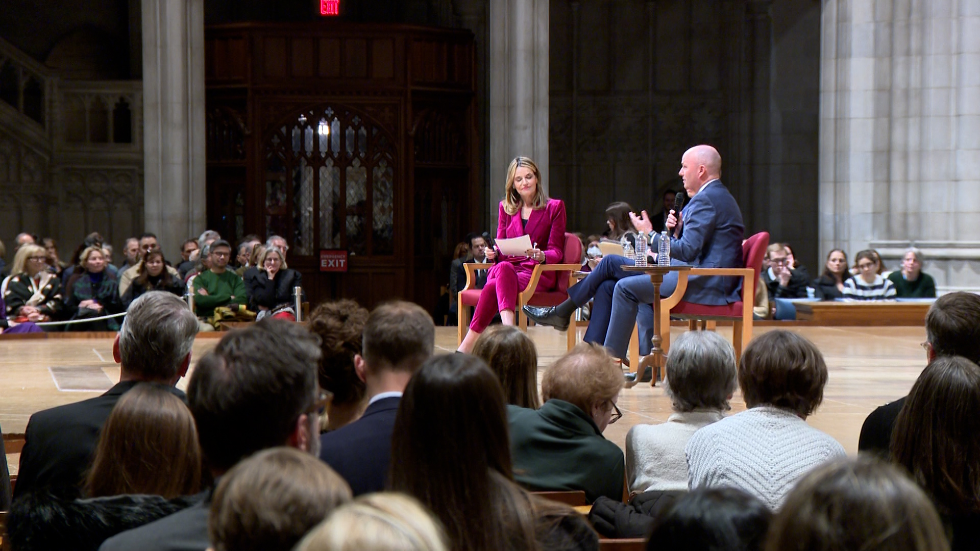 Utah Gov. Spencer Cox, right, speaks at an event at Washington National Cathedral with Pennsylvania Gov. Josh Shapiro and NBC anchor Savannah Guthrie.