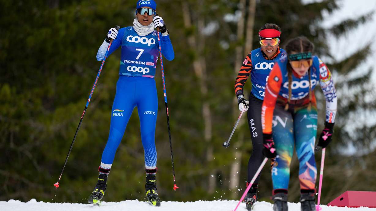FILE - Bhavani Thekkada Nanjunda, of India, Khadijah Ismail, of Malaysia, and Mariana Cabrita, of Portugal, from left, compete in the cross-country women's 7.5 km Interval Start Classic qualification race at the Nordic World Ski Championships in Trondheim, Norway, Feb. 26, 2025.