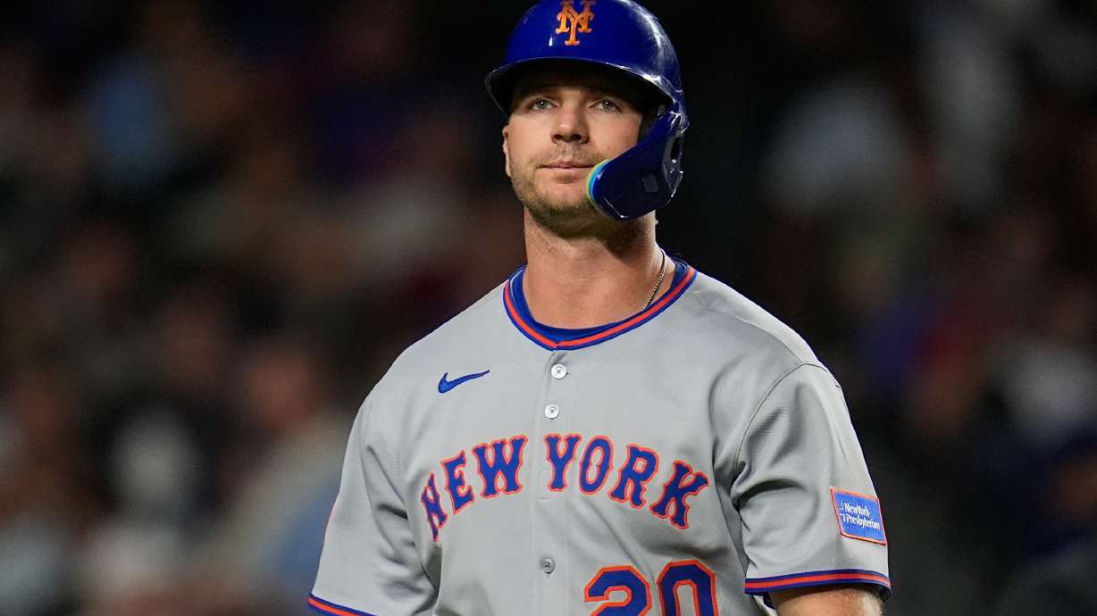 FILE - New York Mets' Pete Alonso returns to the dugout after striking out during the fourth inning of a baseball game against the Chicago Cubs, Sept. 23, 2025, in Chicago.