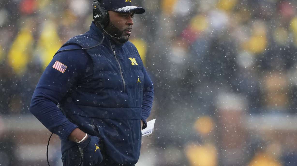 Michigan head coach Sherrone Moore watches from the sideline during the second half of an NCAA college football game against Ohio State, Saturday, Nov. 29, 2025, in Ann Arbor, Mich.