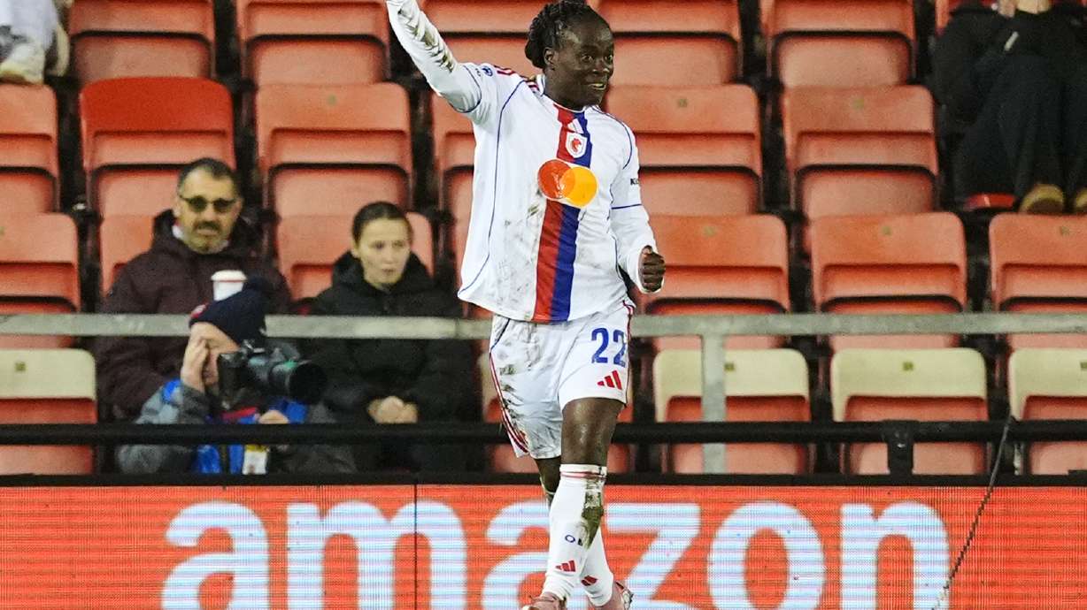 OL Lyonnes' Tabitha Chawinga celebrates scoring their side's first goal during a women's Champions League soccer match against Manchester United, Wednesday, Dec. 10, 2025, in Leigh, England.