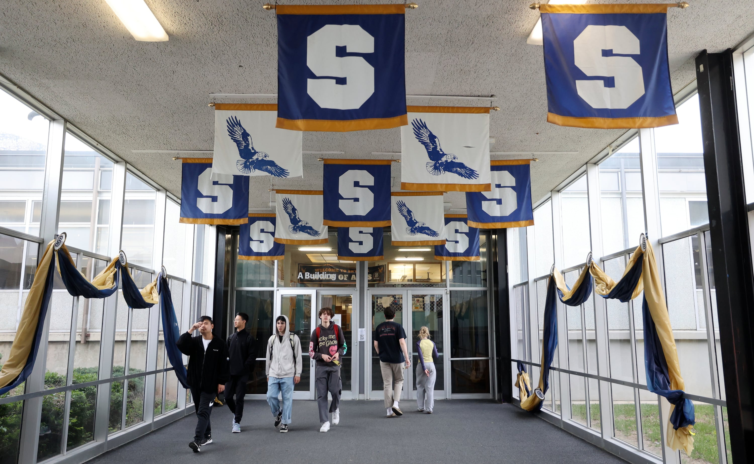 Students walk through Skyline High School in Millcreek on May 22, 2024. Utah's four-year cohort graduation rate rose one percentage point to 89.9%, according to a new report from the Utah State Board of Education released on Wednesday.