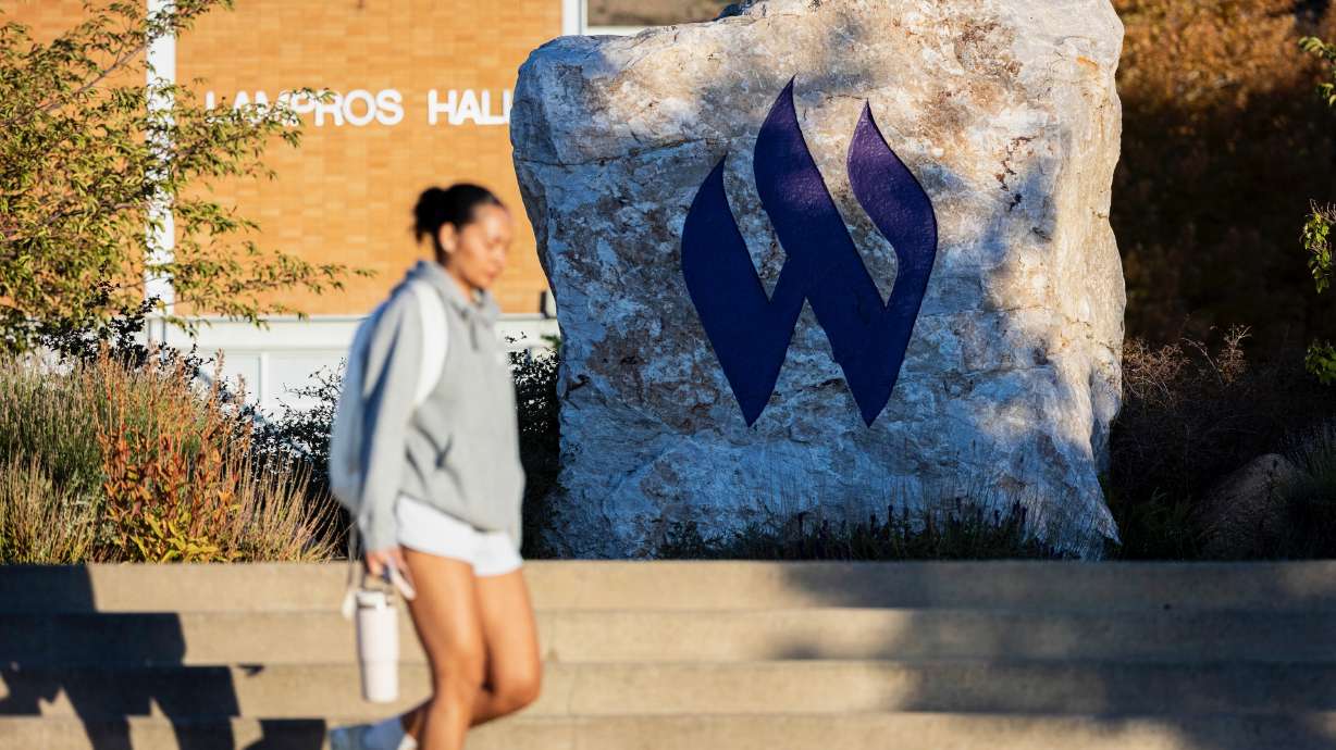 The head of the Utah System of Higher Education says Weber State erred in crafting a list of "prohibited" words applicable to guest speakers. A student passes by the Flaming "W" Rock on the campus of the Ogden school on Oct. 1.