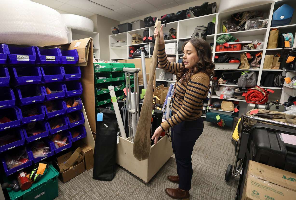 Melissa Royle, Salt Lake City International Airport customer service supervisor, shows an oar at the lost and found at the Salt Lake City International Airport in Salt Lake City on Dec. 4.