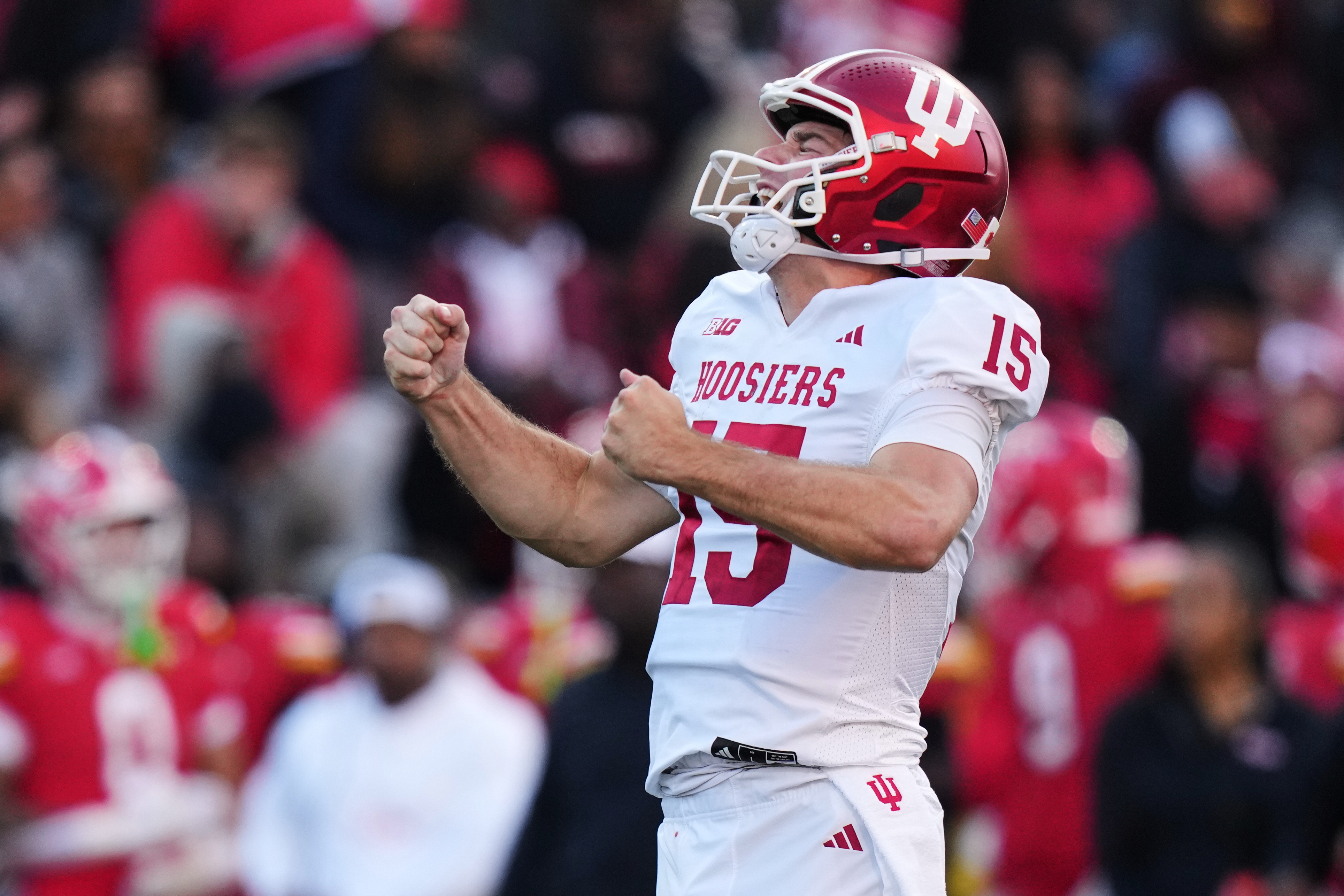 FILE - Indiana quarterback Fernando Mendoza (15) celebrates after throwing a touchdown pass to wide receiver Omar Cooper Jr. during the first half of an NCAA college football game against Maryland, Saturday, Nov. 1, 2025, in College Park, Md. 