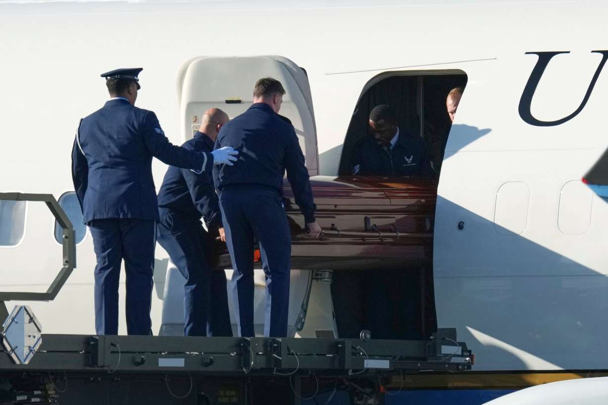 The casket containing the body of conservative activist and Turning Point USA co-founder Charlie Kirk is removed from Air Force Two at Phoenix Sky Harbor International Airport, Sept. 11, in Phoenix, Ariz. Erika Kirk asked for grace for the family as conspiracy theories around her husband's death swirled.