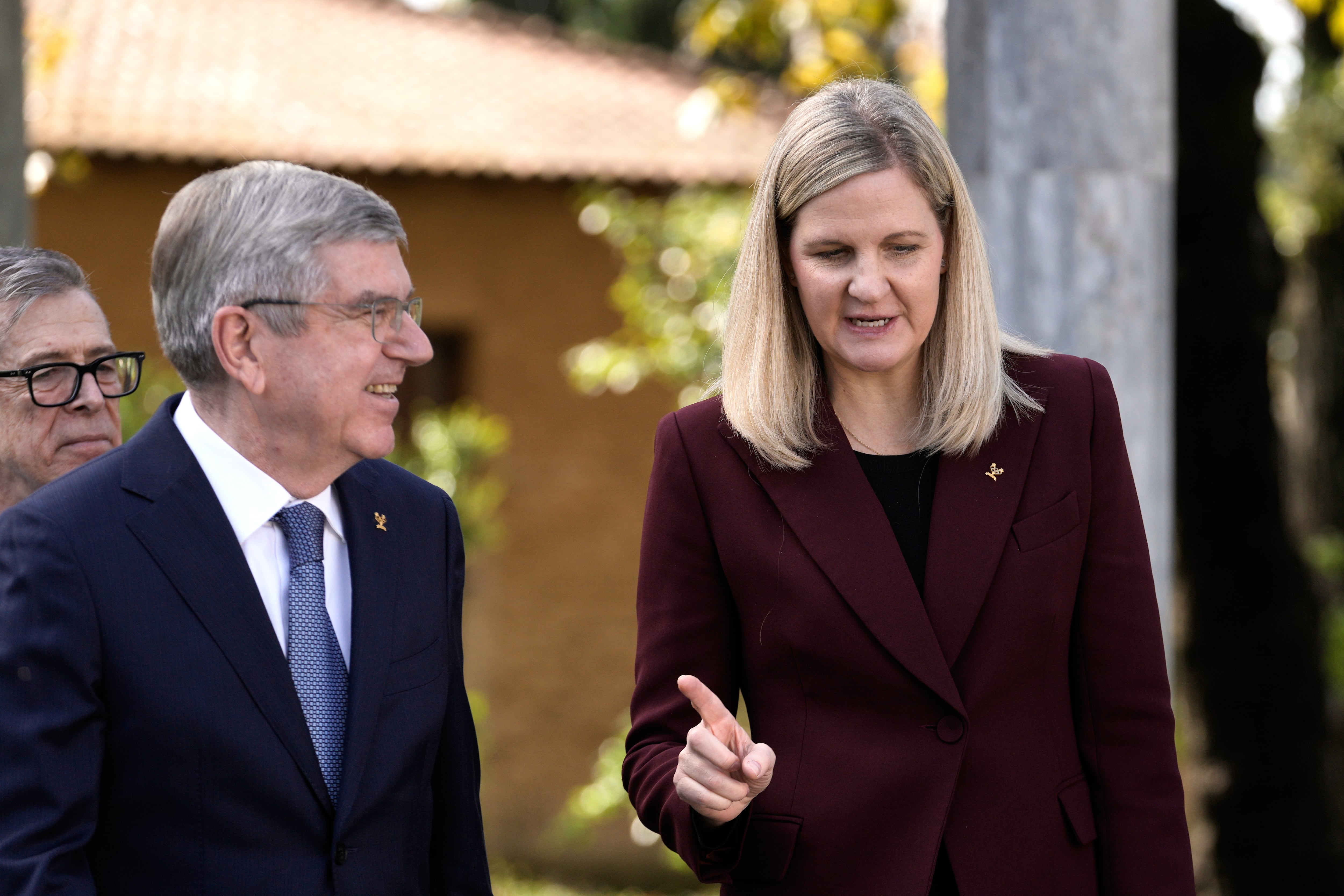 Kirsty Coventry, President of the International Olympic Committee, right, speaks with former president Thomas Bach before the flame lighting ceremony for the Milan Cortina 2026 Winter Olympics, at the archaeological museum of Olympia, Greece, Nov. 26.