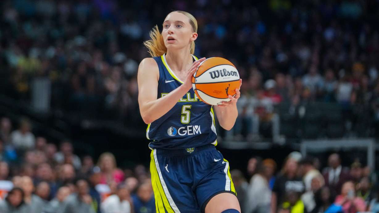 FILE - Dallas Wings guard Paige Bueckers works the floor against the Indiana Fever during the second half of a WNBA basketball game Aug. 1, 2025, in Dallas.