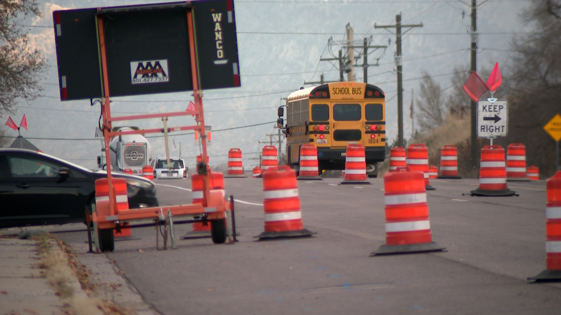 A school bus navigates through the construction on U.S. 89 in Willard, Box Elder County, Thursday. Construction has reduced traffic to two lanes — one going each way.