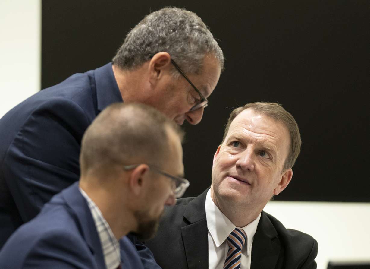 Defense attorney Richard Novak, top, speaks with Utah County Attorney’s Office general counsel Christopher Ballard, right, during a hearing for Tyler Robinson in Provo's 4th District Court on Thursday. Robinson is accused of fatally shooting Charlie Kirk.