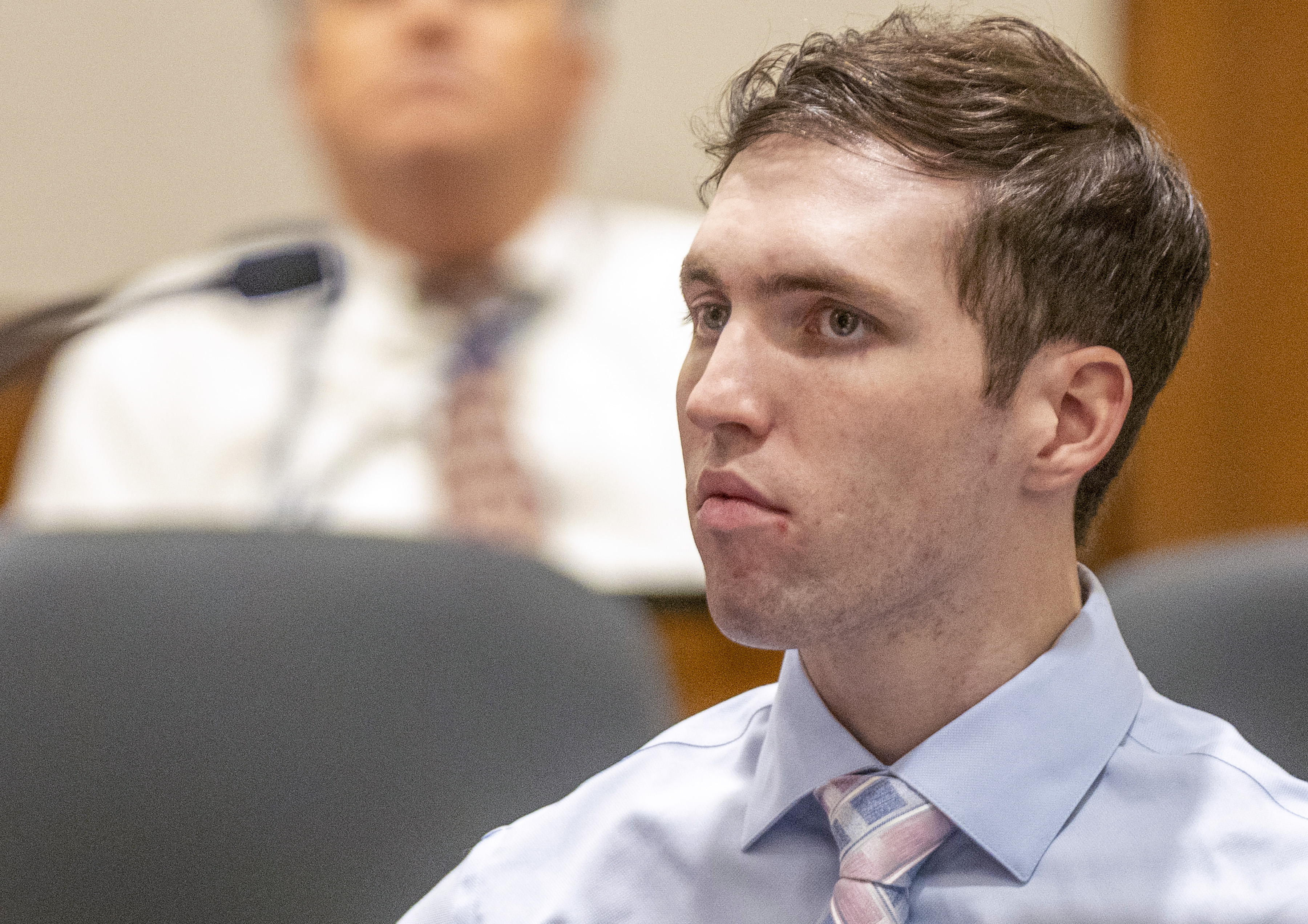 Tyler Robinson, accused in the fatal shooting of Charlie Kirk, appears in 4th District Court in Provo on Dec. 11, 2025. The Utah County Attorney's Office does not believe Robinson's former roommate needs to attend Robinson's preliminary hearing in person