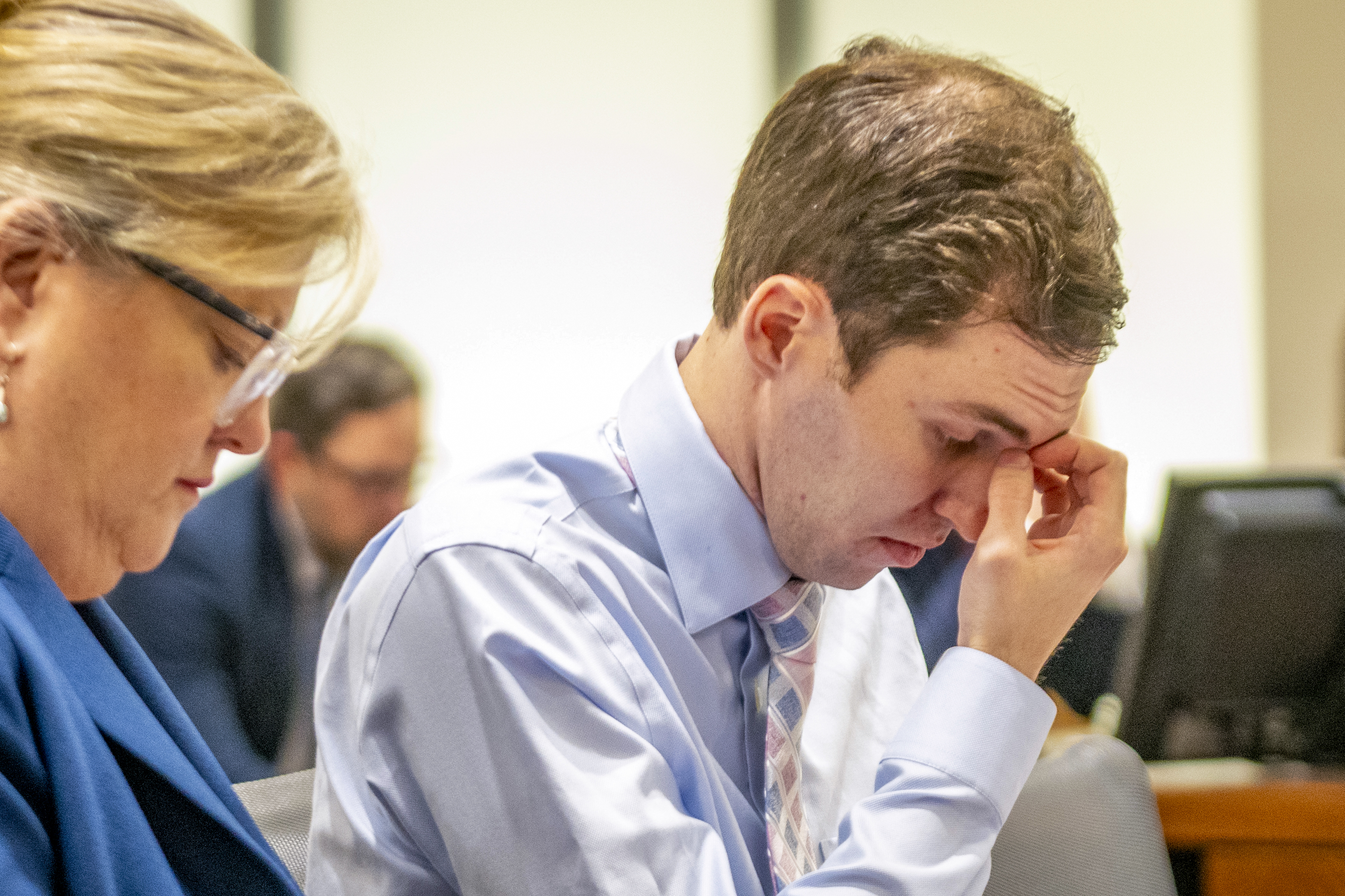 Attorney Kathryn Nester, left, sits next to Tyler Robinson during a hearing in Provo's 4th District Court on Dec. 11, 2025. Robinson is accused of fatally shooting Charlie Kirk.