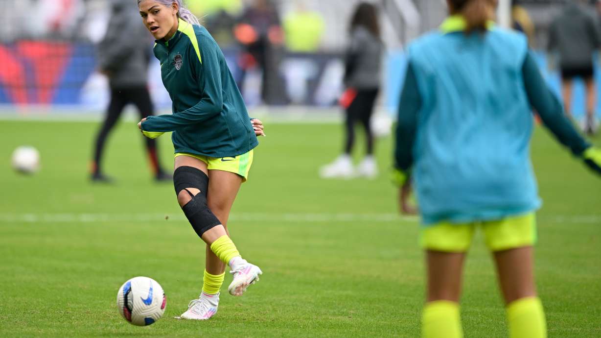 Washington Spirit forward Trinity Rodman warms up before a NWSL semifinal women's soccer match against Portland Thorns FC, Saturday, Nov. 15, 2025, in Washington.
