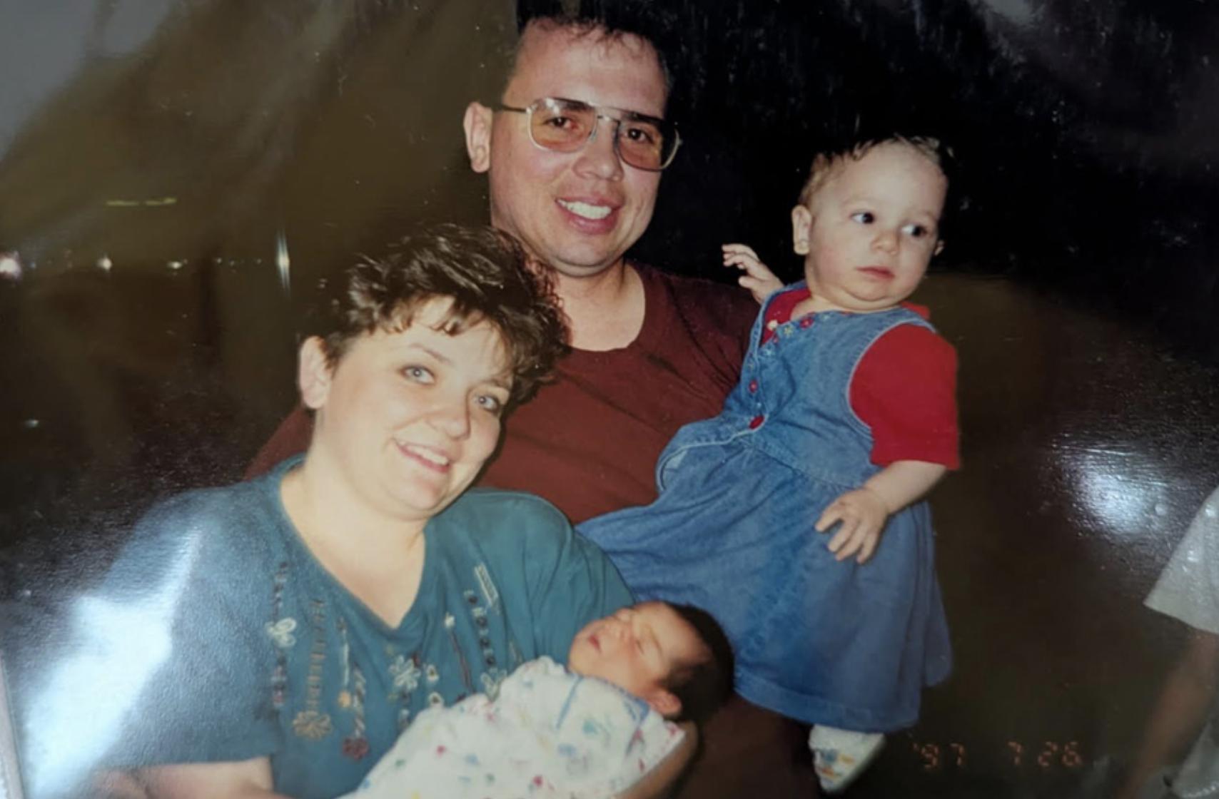 McKenna Christensen and her adoptive family are pictured in Moldova.