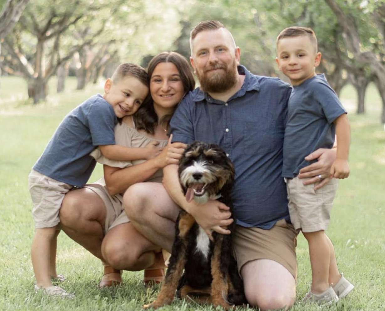 McKenna is pictured with her husband, Tyson, and children, Sawyer and Hudson.