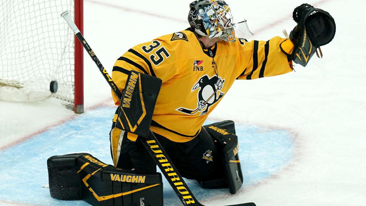 A shot by Montréal Canadiens' Alexandre Texier gets by Pittsburgh Penguins goaltender Tristan Jarry (35) for a goal during the first period of an NHL hockey game, Thursday, Dec. 11, 2025, in Pittsburgh.