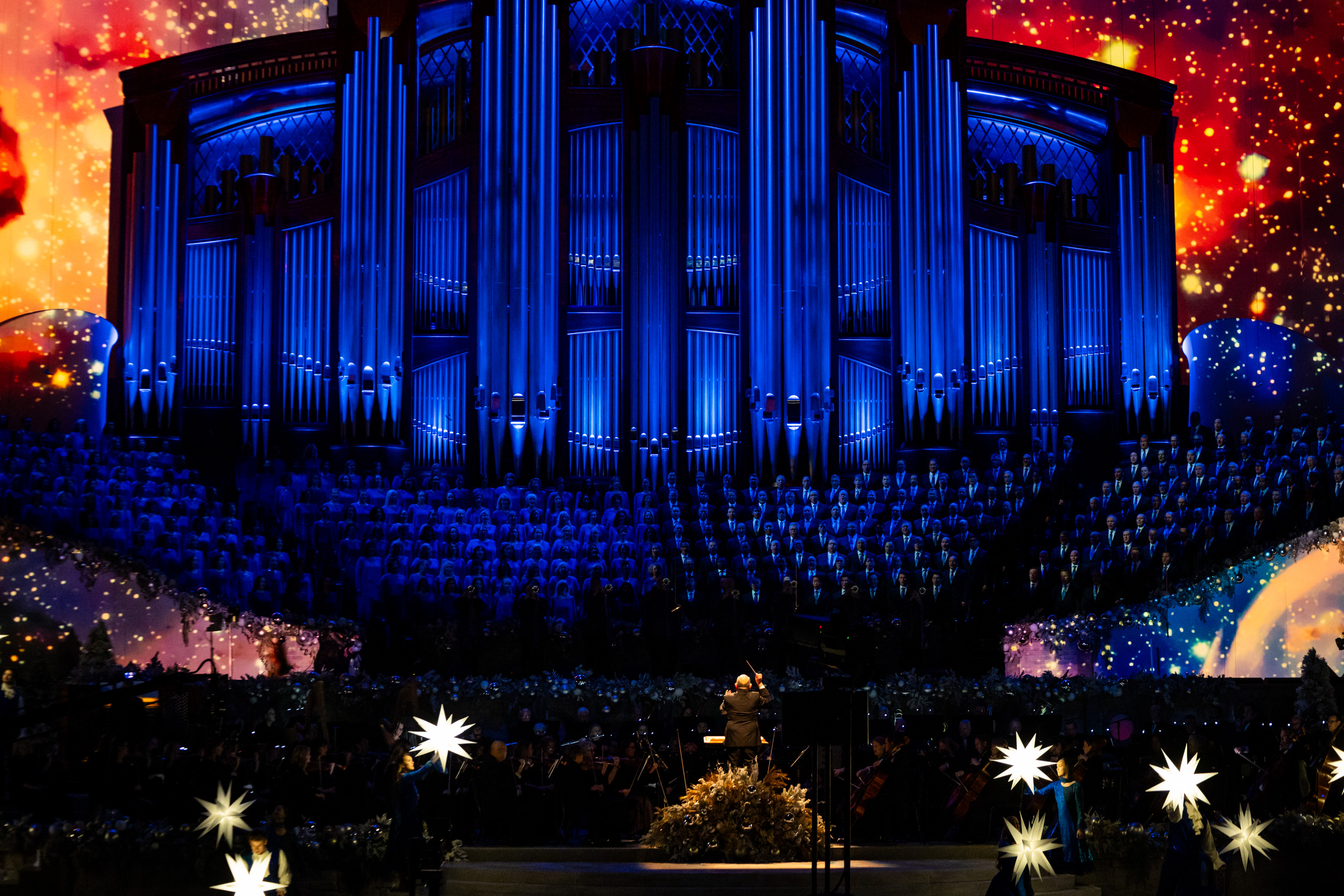 The Tabernacle Choir at Temple Square performs during the Christmas concert at the Conference Center in Salt Lake City on Thursday.