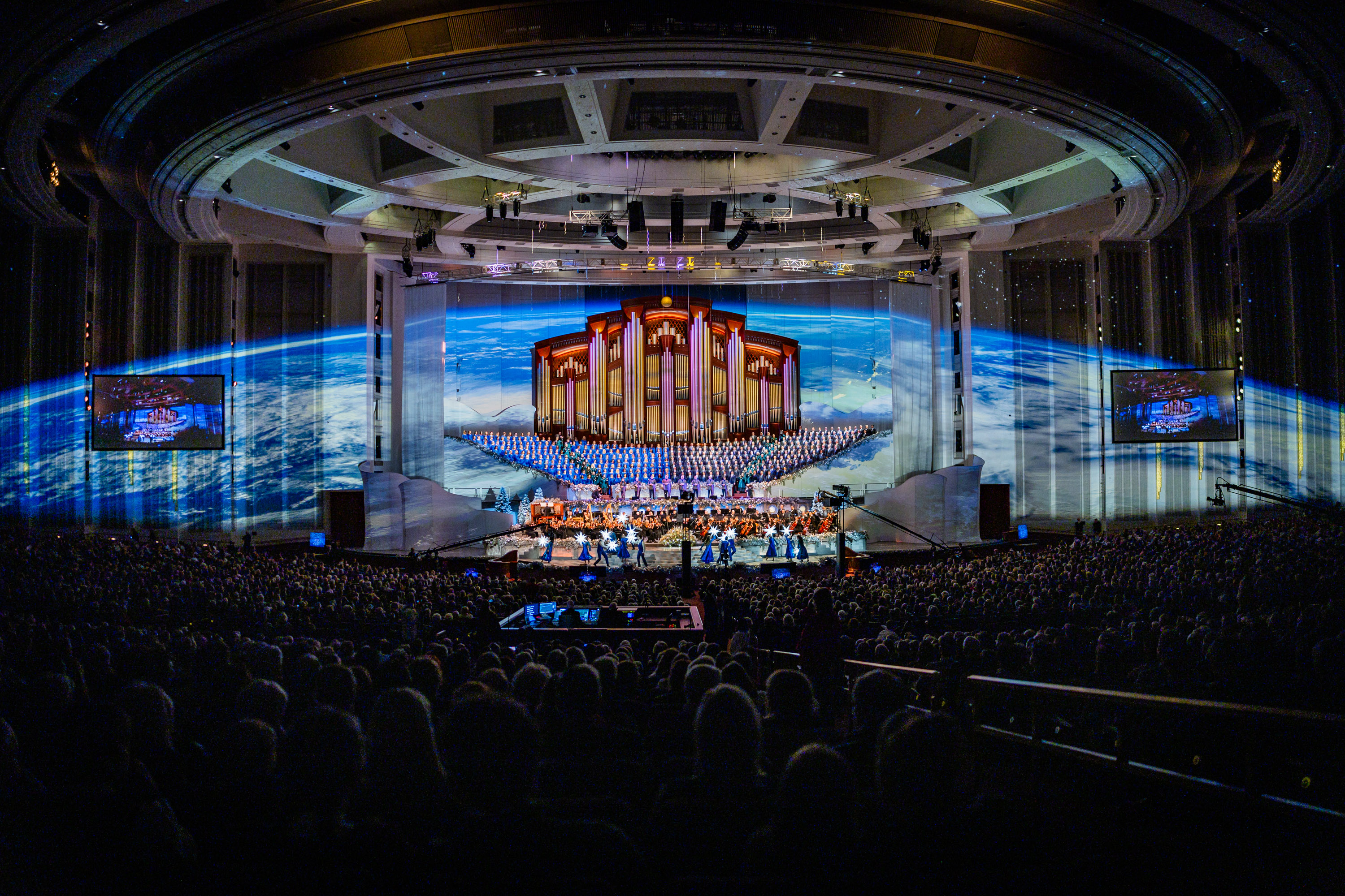 The Tabernacle Choir at Temple Square, Orchestra at Temple Square, Bells at Temple Square and Gabriel's Trumpets perform during the Christmas concert at the Conference Center in Salt Lake City on Thursday.