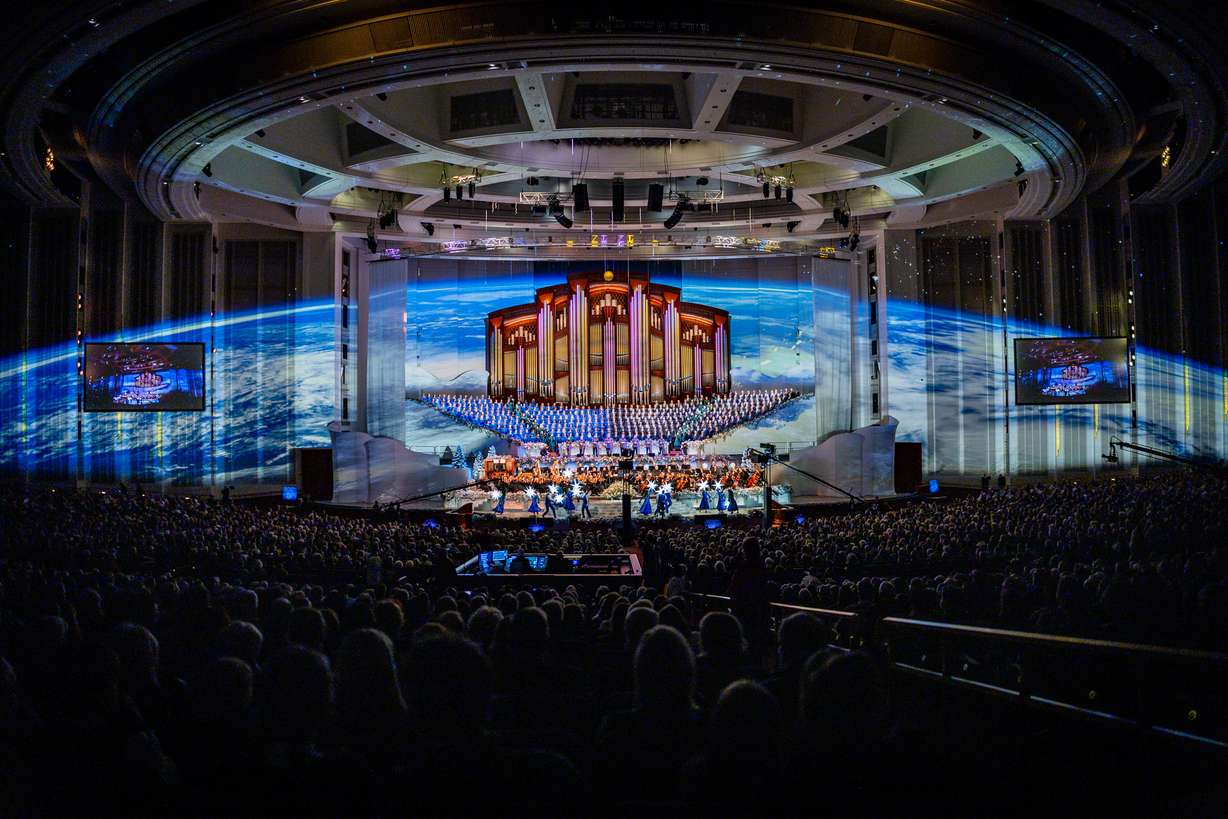 The Tabernacle Choir at Temple Square, Orchestra at Temple Square, Bells at Temple Square and Gabriel's Trumpets perform during the Christmas concert at the Conference Center in Salt Lake City on Thursday.