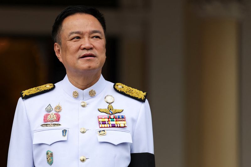 Thailand's Prime Minister Anutin Charnvirakul looks on ahead of making offerings to monks, on the day he speaks to members of the media to announce the dissolution of parliament at the Government House in Bangkok, Friday. Anutin said he asked President Donald Trump to urge Cambodia to cease hostilities after their border conflict reignited.