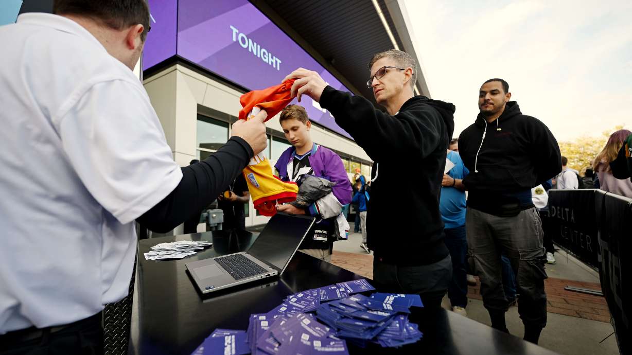 James Phelps and Bryan Phelps exchange old jerseys for new ones ahead of the Jazz and Clippers playing at the Delta Center in Salt Lake City on Oct. 22. The team is bringing the promotion back on Dec. 20.