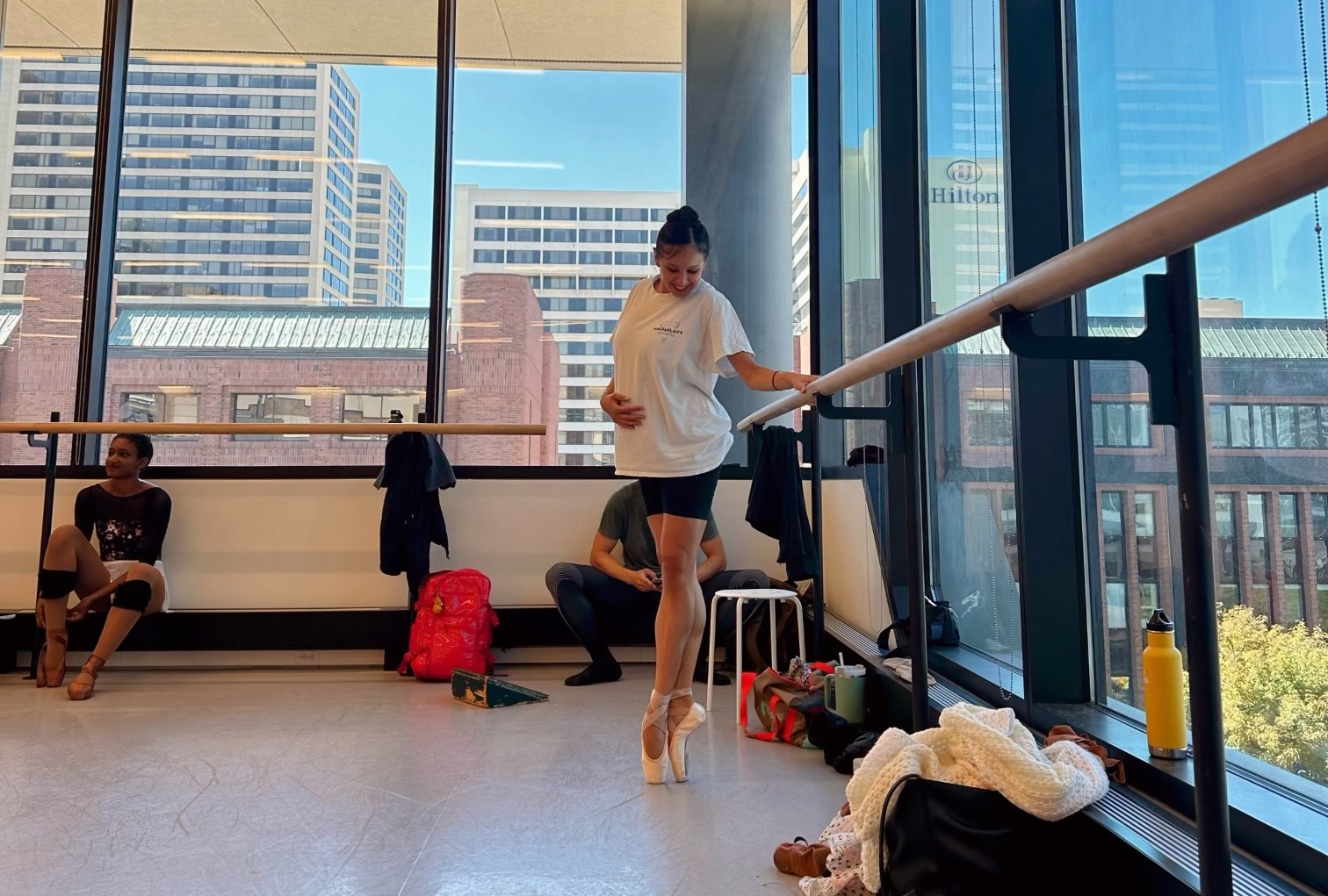Ballet West principal artist Jenna Rae Herrera gets ready for dance class while pregnant with her son Theo. She shared how becoming a mother has impacted her dancing.