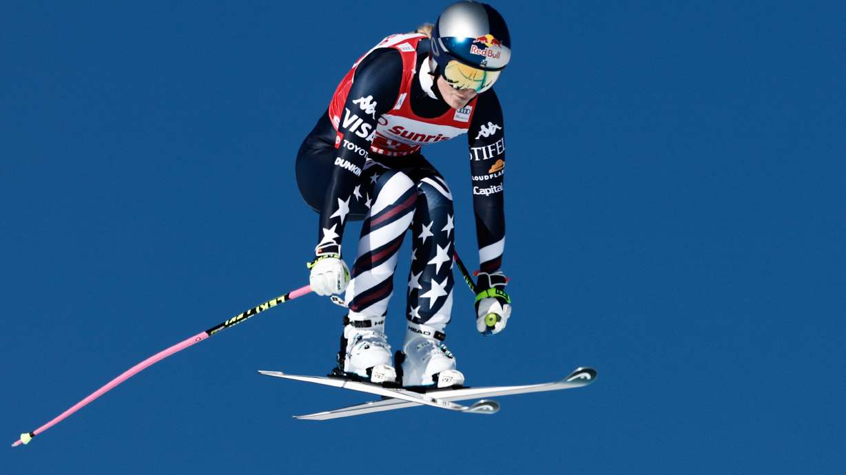 United States' Lindsey Vonn speeds down the course during an alpine ski, women's World Cup downhill, in St. Moritz, Switzerland, Saturday Dec. 13, 2025.