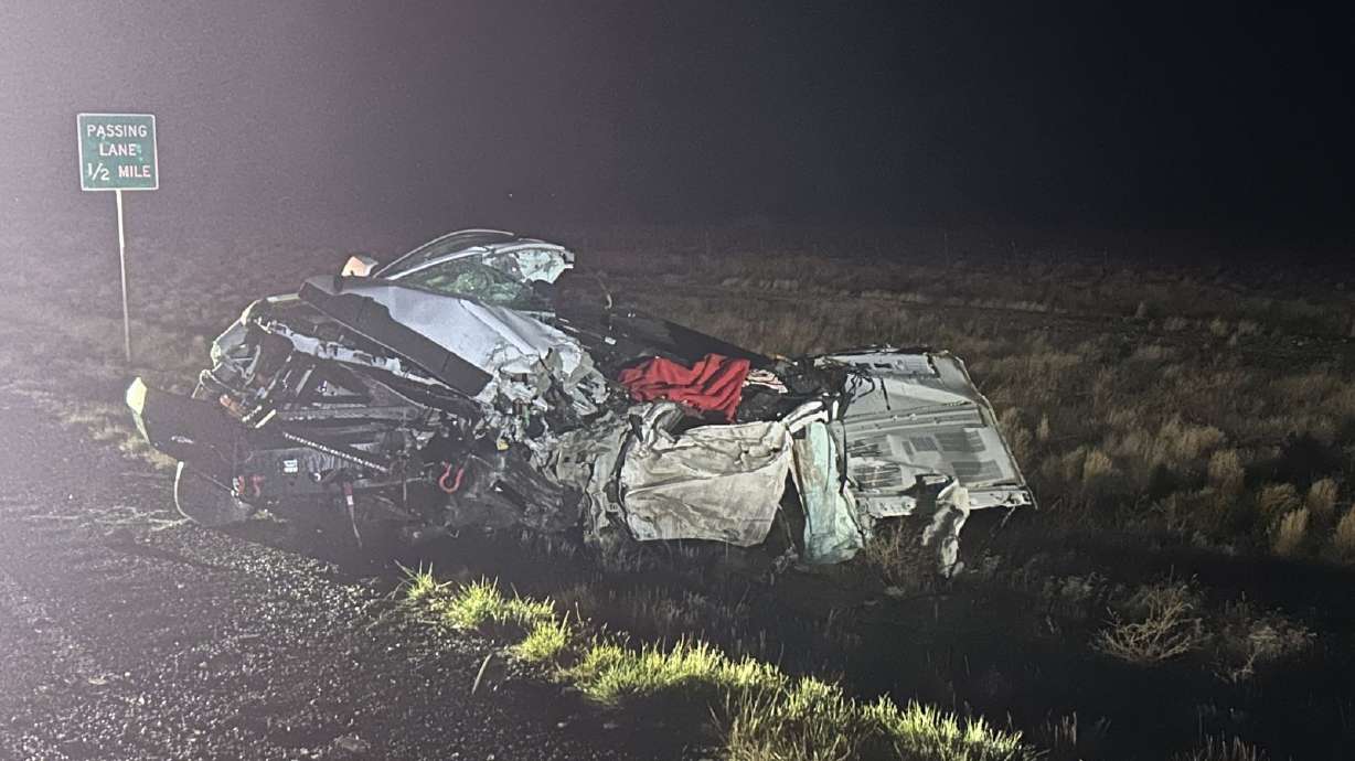 A truck driver was killed and 18 people were injured Friday night in a head-on collision with a school bus in Ephraim.