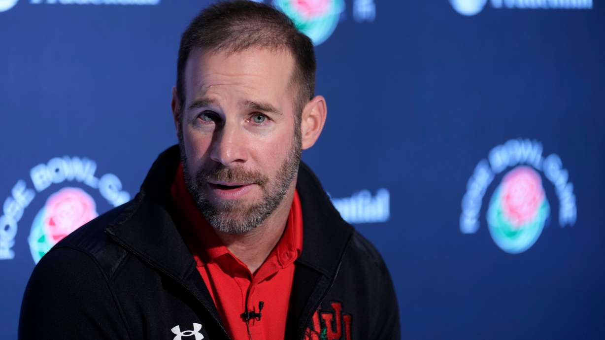 FILE - Utah defensive coordinator Morgan Scalley fields questions during a news conference ahead of the Rose Bowl NCAA college football game against Penn State Dec. 29, 2022, in Los Angeles.