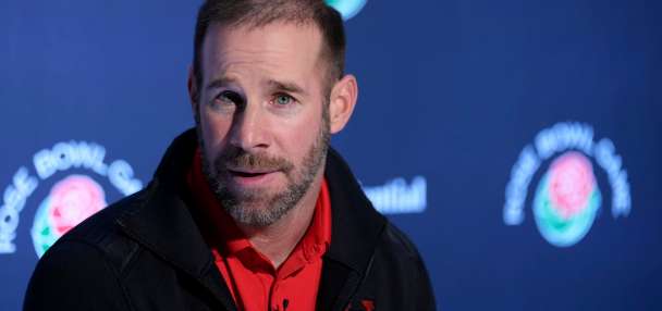 Morgan Scalley promoted from defensive coordinator to head coach at Utah, succeeding Whittingham