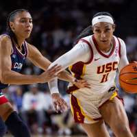 Azzi Fudd leads No. 1 UConn's 79-51 rout of 16th-ranked USC with JuJu Watkins looking on
