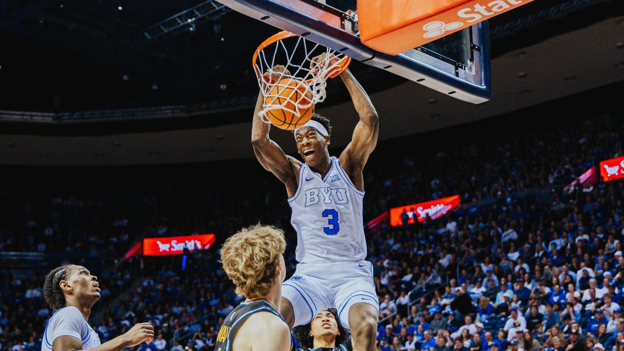BYU wing AJ Dybantsa throws down a dunk during a men's college basketball game against UC Riverside, Saturday, Dec. 13, 2025 at the Marriott Center in Provo, Utah.