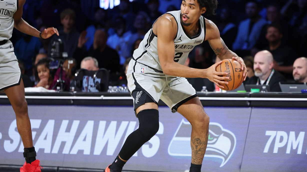 San Antonio Spurs guard Dylan Harper (2) sets to play the ball in the first half of an NBA Cup semifinals basketball game against the Oklahoma City Thunder, Saturday, Dec. 13, 2025, in Las Vegas.