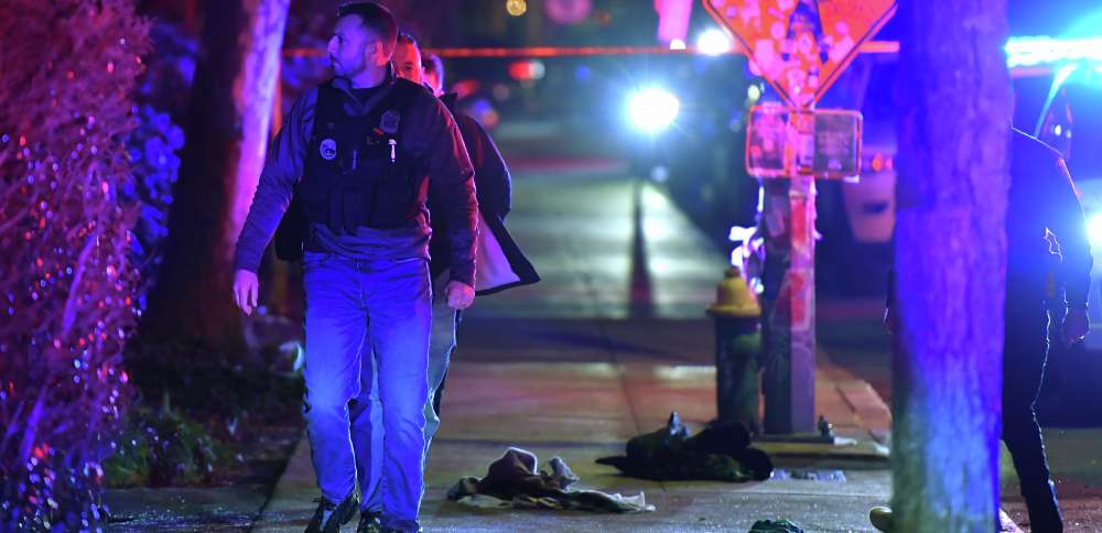 Police have person of interest in custody in Brown University shooting that killed 2, wounded 9